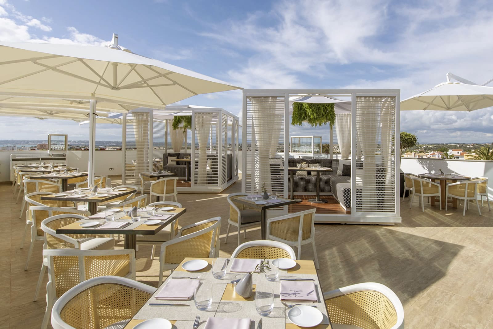 Outdoor terrace at Paper Moon Algarve with scenic views