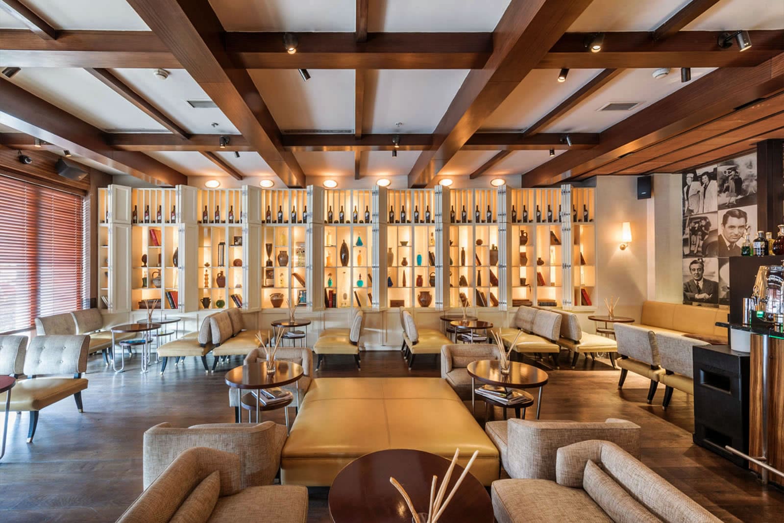 Stylish corner of the restaurant with warm lighting and sleek furniture