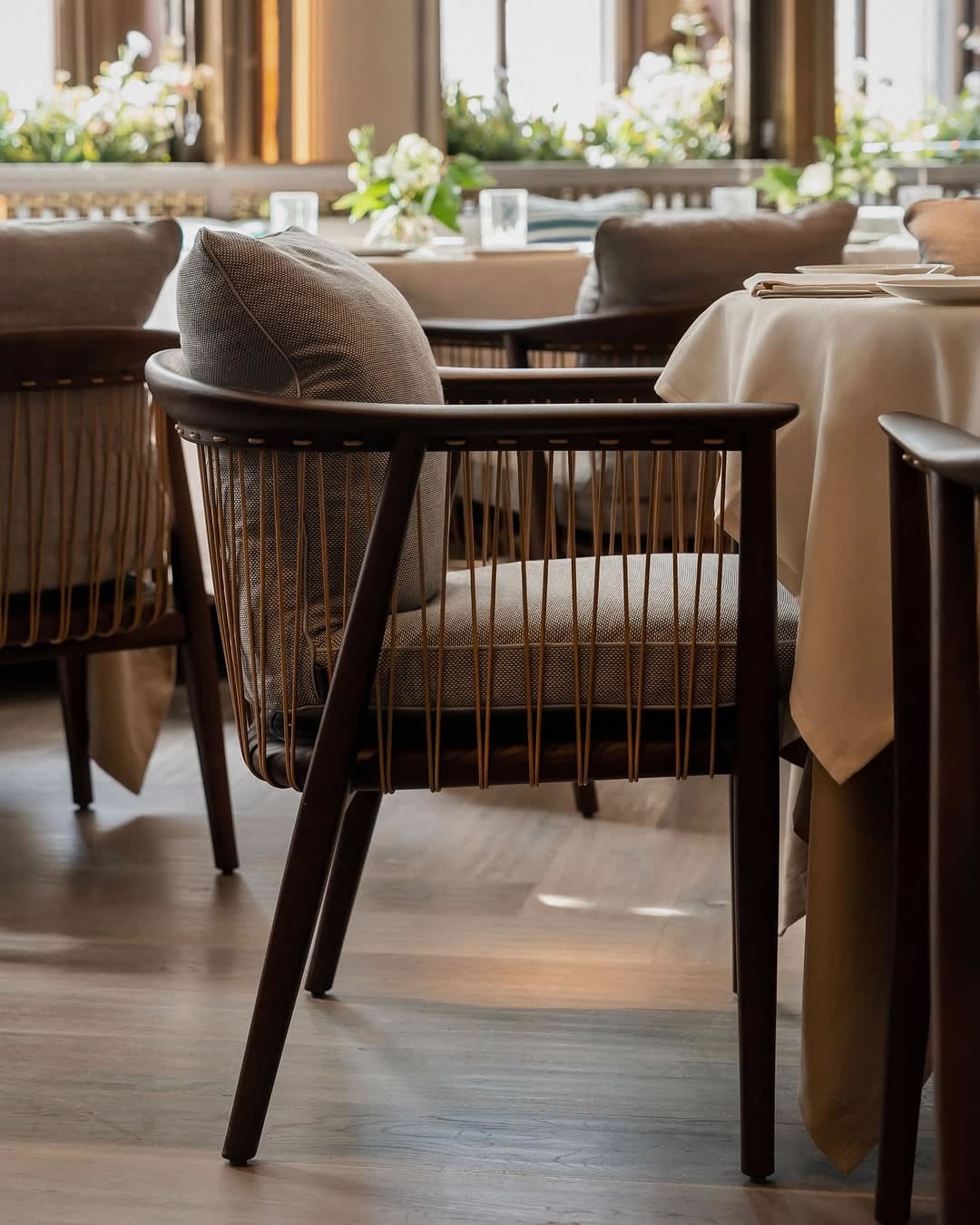 Refined interior of Paper Moon London featuring stylish seating and artistic lighting Refined interior of Paper Moon London featuring stylish seating and artistic lighting