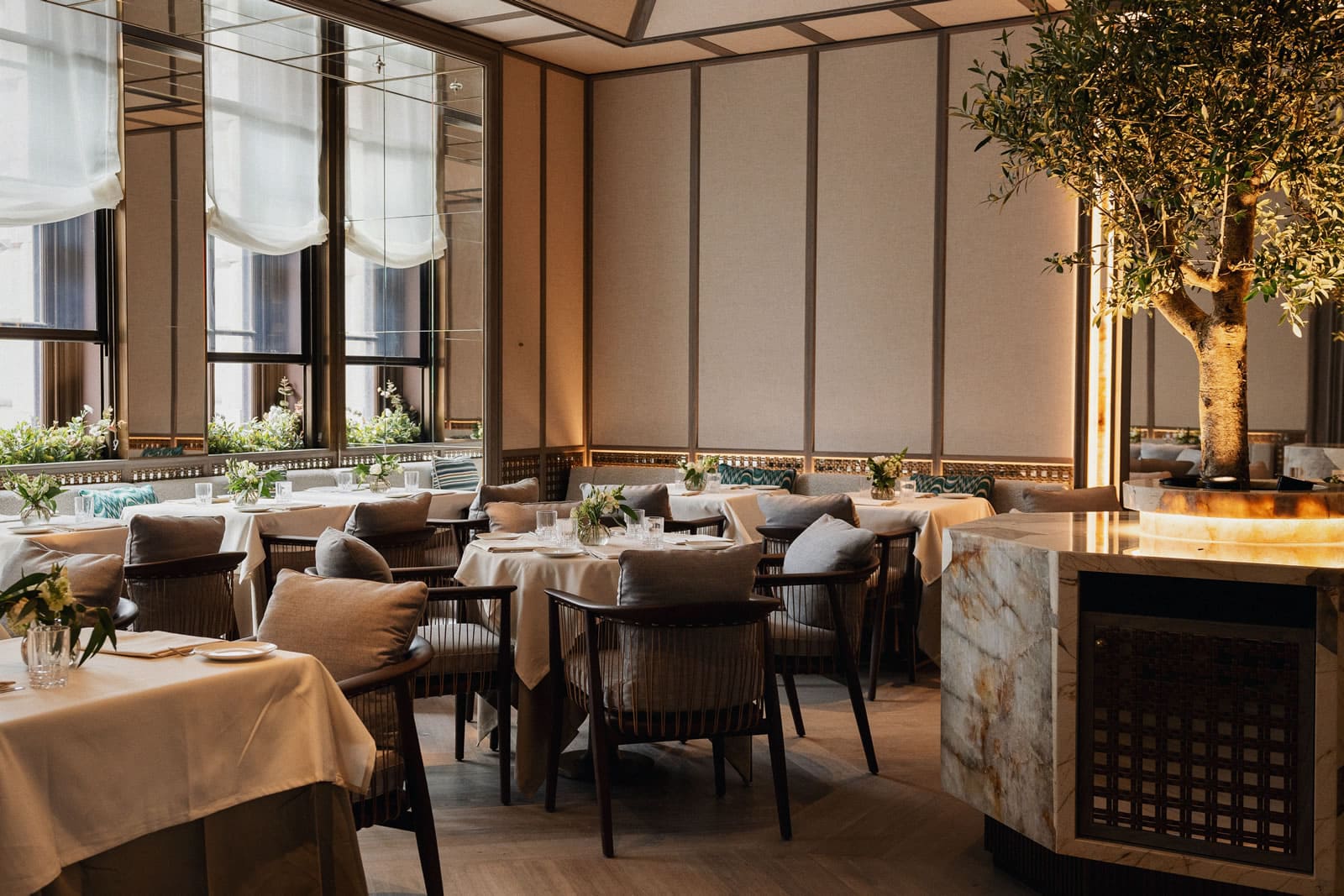 Refined interior view of Paper Moon London with ambient lighting