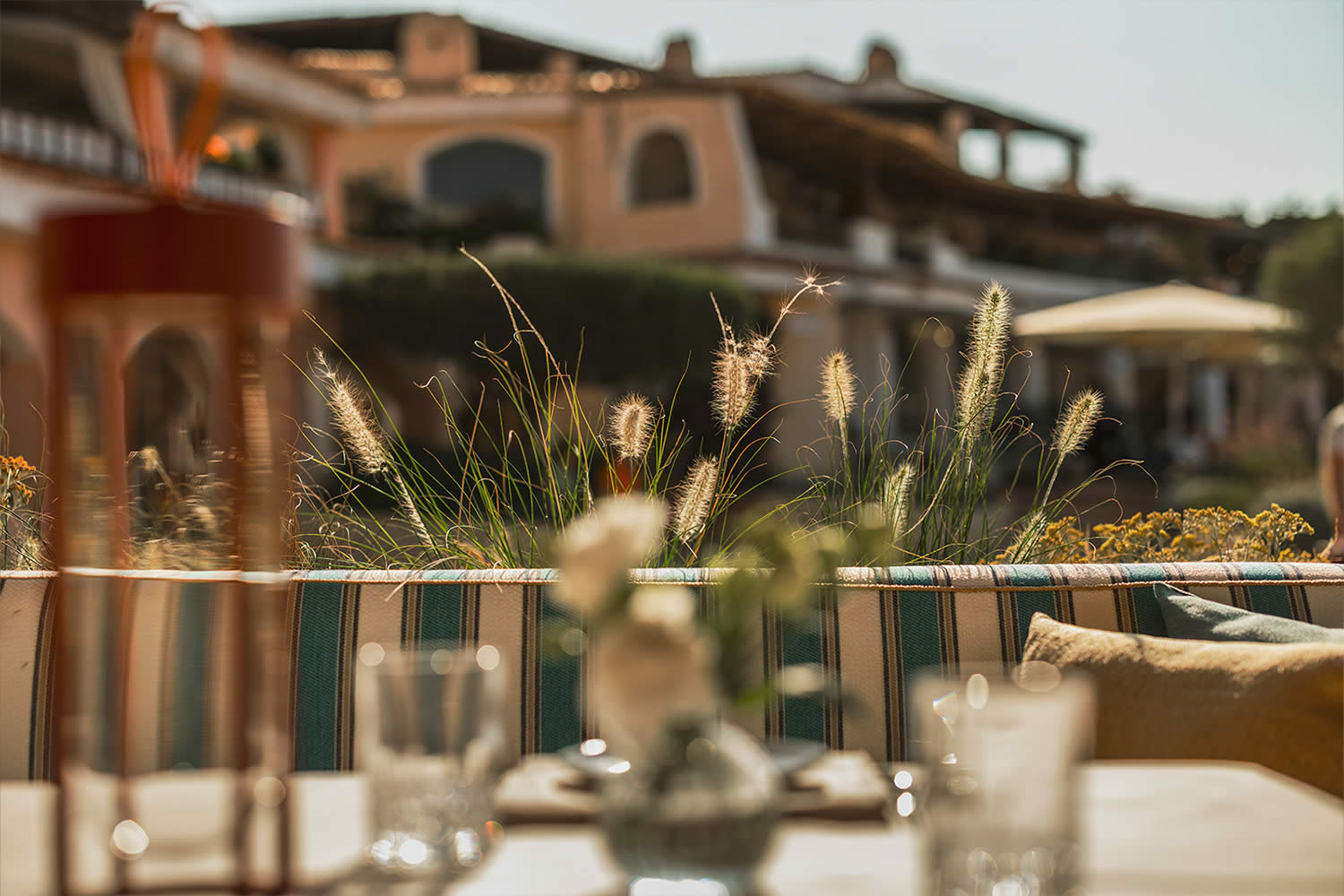 Paper Moon Porto Cervo beachfront entrance at sunset