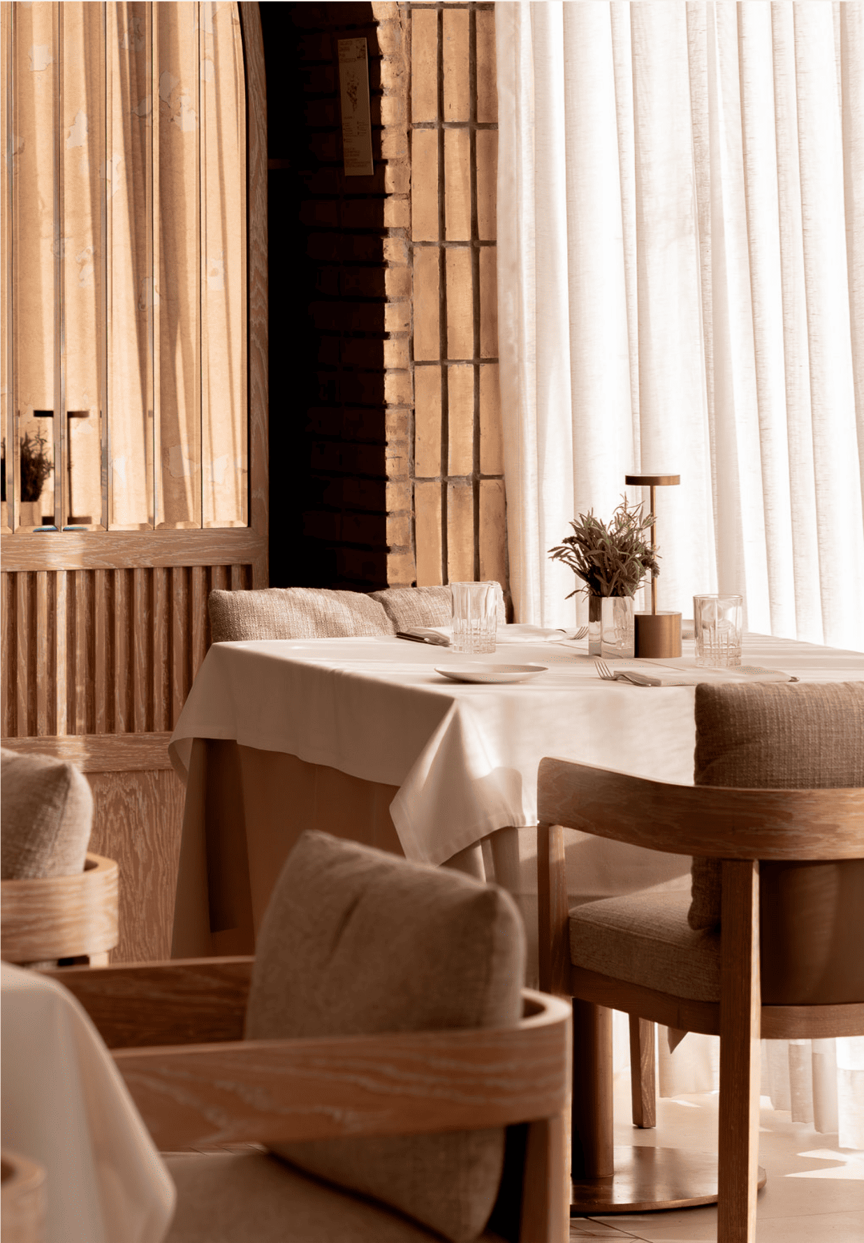 Elegant dining interior at Paper Moon Taghazout with ocean-inspired design Elegant dining interior at Paper Moon Taghazout with ocean-inspired design